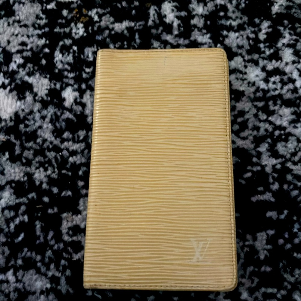 LV check book cover